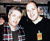 Impresario David Azoulay (right) with a client, singer Shlomo Artzi.